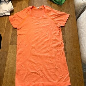 Orange size 4 lululemon swiftly tech